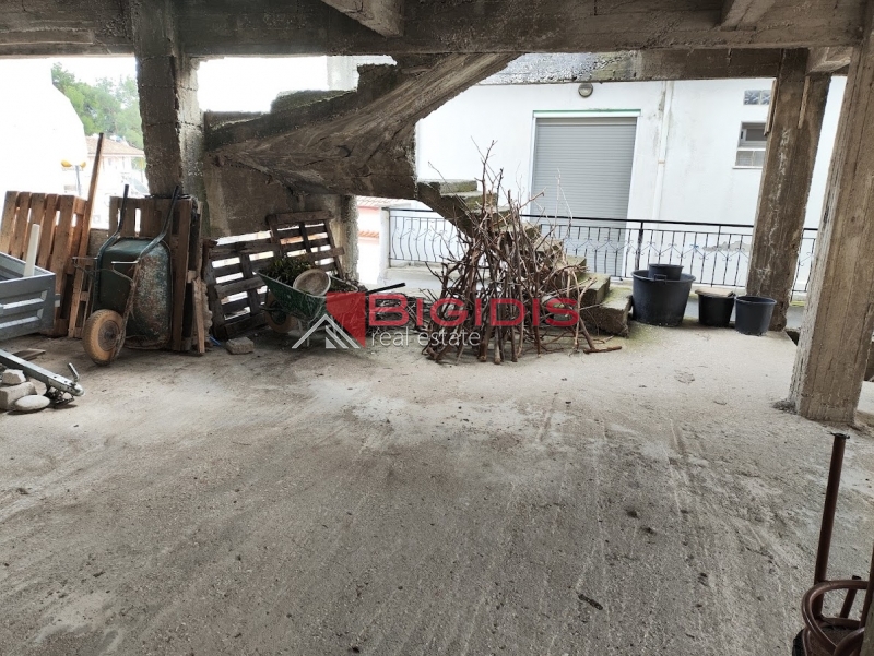 Αξιοποιησιμο οικόπεδο 206 μ2 με κτίριο 145 μ2